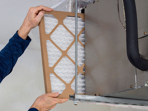 An HVAC air filter being installed in a Simi Valley, CA, home.