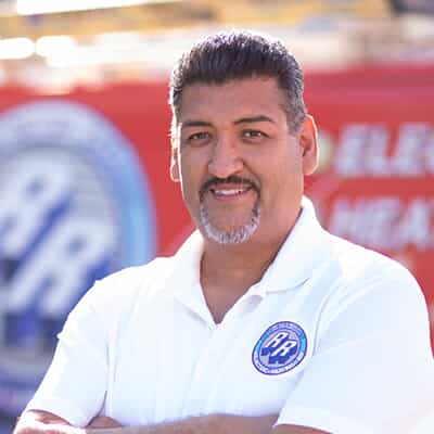 A professional photo of Richard Rogero, president of RR Services